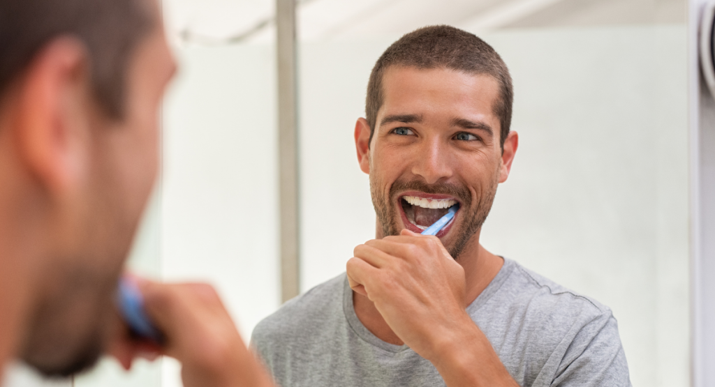 a man cleaning tooth